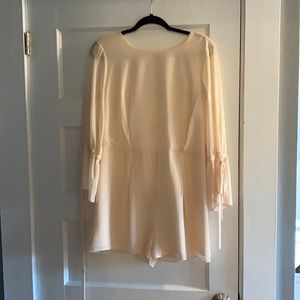 Naked Zebra light pink romper. NWT.